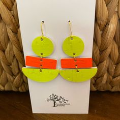 Lightweight Cork Earrings. Handmade Neon Highlighter Yellow And Orange Color Combination. Made With Cork That Is Backed With Leather And Hypoallergenic Gold Color Ear Wires. Overall Length Is Approximately 2 And 1/2 Inches. These Bright Earrings Can Be Dressed Up Or Down. Wear With The Bright Colors Of The Spring And Summer Trends Or Add A Pop Of Color To Any Neutral Outfit. Super Lightweight, Versatile And Original! Bright Earrings, Orange Color Combinations, Cork Earrings, Earrings Polymer, Orange Earrings, Lightweight Earrings, Neutral Outfit, Ceramic Jewelry, Dry Clay