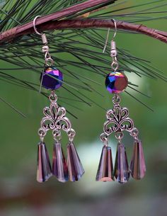 Czech Glass Crystal Dangle Earrings, Elegant Purple Crystal Earrings With Dangling Beads, Czech Glass Dangle Jewelry For Party, Elegant Purple Wire Wrapped Crystal Earrings, Nickel-free Crystal Chandelier Earrings Gift, Purple Dangle Crystal Earrings, Purple Metal Dangle Crystal Earrings, Silver Chandelier Earrings With Faceted Beads, Purple Metal Chandelier Earrings For Gifts