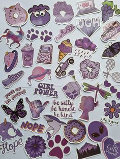 purple and white stickers with different types of things on them, all in the shape of hearts