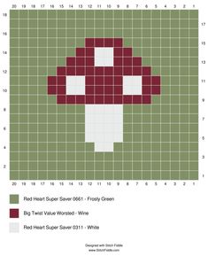 a cross stitch pattern with a red and white mushroom in the center on green squares