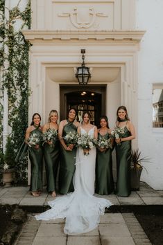 bride and her bridesmaids in green dresses