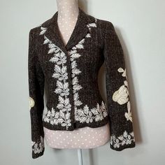 Johnny Was Biya Brown Tweed Wool Embroidered Sequins Blazer Jacket. Excellent Condition, Gorgeous, Lined, Tag Size Cs But Can Fit Size Small Too, 100% Wool, Brown Cream Color Mix Aprox Measurements Flat Bust 17” Waist 14 3/4” Length 20” A14 *Measurements Are Approximate *Please See Photos And Ask Questions Before Purchasing *I Am Always Open To A Reasonable Offers *Please, Be Kind And Leave A Review After Receiving Your Purchase My Listings Come From A Smoke-Free Home. Spring Fitted Outerwear With Intricate Embroidery, Fitted Spring Outerwear With Intricate Embroidery, Vintage Cream Outerwear With Floral Embroidery, Fitted Winter Blazer With Floral Embroidery, Spring Embroidered Fitted Blazer, Fitted Embroidered Vintage Outerwear, Vintage Embroidered Blazer For Fall, Vintage Outerwear With Intricate Embroidery For Fall, Winter Fitted Embroidered Blazer