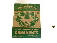 an old shiny brite glass christmas tree ornament set in its original box