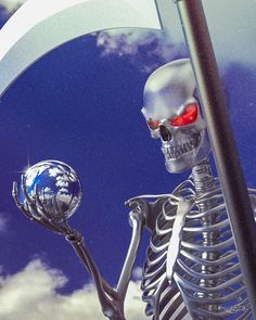 a skeleton holding a crystal ball in its hand