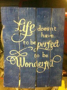 a wooden sign that says life doesn't have to be perfect to be wonderful