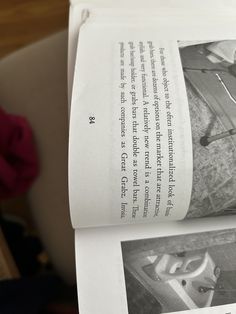 an open book with black and white photos on it