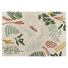 an area rug with leaves and plants on it