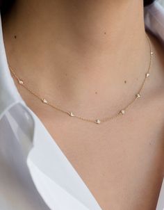 14k yellow gold necklace with 10 bezel diamonds around the neck line. Uber chic and dainty, wear it by itself or layered. Comes with a 16"- 17" -18" adjustable chain Size of Bezel Diamond: Approx. 0.03 (ct. tw) Diamond Quality: VS Total Weight: Approx. 2 grams Rush orders ship in 2-4 business days Comes gift ready in a custom Zoe Lev jewelry box Diamond By The Yard, Sterling Silver Star Earrings, Delicate Jewellery, Simple Chain, Whimsical Jewelry, 14k Yellow Gold Necklace, Solid Gold Necklace, Gold Fashion Necklace