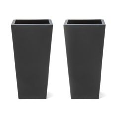 two black vases sitting next to each other on a white background, one is empty