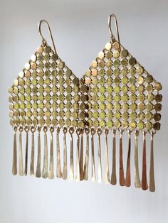 Modern fringed earrings feature panels of gold metal mesh reclaimed from a vintage, mid-century purse (circa 1960-1980s) atop glittering stands of hand hammered, 14k gold filled drops. Ruoko Mesh Earrings measure 2.25" tall x 1.5" wide. 14 karat gold filled frames and earrings. Each earring signed with our logo link. ** These earrings will be made to order and require extra time. Please add two weeks to your shipping estimate. Black Cat Superstition, Mixed Metal Jewelry, Metal Mesh, Gold Filled Earrings, Antique Metal, Contemporary Jewelry, Gold Design, Chains Jewelry, Metal Jewelry