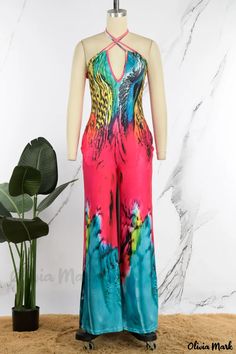 Olivia Mark - Stylish Multicolor Casual Print Backless Halter Jumpsuits with a Touch of Elegance Multicolor Stretch Halter Neck Bodysuit, Spring Multicolor Backless Jumpsuits And Rompers, Stretch Multicolor Printed Jumpsuits And Rompers, Multicolor Printed Stretch Jumpsuits And Rompers, Multicolor Stretch Printed Jumpsuits And Rompers, Multicolor Stretch V-neck Bodysuit, Sleeveless Multicolor Fitted Bodysuit, Multicolor Stretch Jumpsuits And Rompers For Beach, Stretch Multicolor Jumpsuits And Rompers For Party