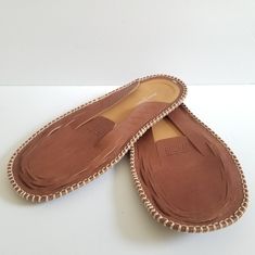 Maison Margiela Leather Flat Mules Size 39 Us 9 Features: Brown Tan, Leather Upper And Lining, Leather Sole, Round Toeline, Designer Logo, Pebbled Sole Made In Italy New In Box! Never Worn! Brown Flat Sandals With Leather Sole, Beige Leather Espadrilles With Woven Sole, Beige Leather Mules With Rubber Sole, Beige Leather Sandals With Woven Sole, Brown Designer Sandals With Woven Sole, Leather Open Toe Mules With Woven Sole, Leather Slip-on Espadrilles With Stitched Sole, Brown Suede Flat Heel Espadrilles, Leather Slip-on Espadrilles With Rubber Sole