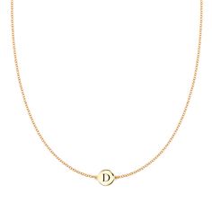 Our Initial Collection is subtle, easy and made to follow your lifestyle, like a second skin: Small enough to sleep in and never take off. The Solitaire Initial Necklace in solid 14k gold is available in various lengths. The initial is engraved on both sides of the disc so it's ok if it flips! After the initial is engr Necklace Initial Letter D, Letter D Necklace, N Necklace, D Necklace, M Necklace, Gold Disc Necklace, Mini Necklace, Initial Necklace Gold, Gold Disc