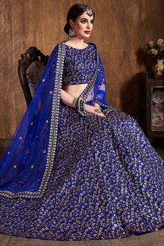 Product Features: Color: Royal Blue Lehenga Fabric: Raw Silk Blouse Fabric: Raw Silk Dupatta Fabric: Soft Net Work: ZARI AND SEQUINS HEAVY EMBROIDERY WORK Ocassion: Designer Embroidery Work Wash Care: Dry Clean Package Contain: 1 Lehenga, 1 Blouse And 1 Dupatta Prodcut Type: Lehenga Set Disclaimer: There will be slight difference in digital to actual image Punjabi Wedding Lengha, Silk Lehenga Designs, Royal Blue Lehenga, Silk Lehenga Choli, Raw Silk Lehenga, Sabyasachi Lehenga, Wedding Dress Outfit, Bollywood Lehenga, Blue Lehenga