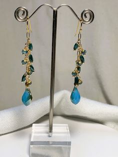 Beautiful fire polished crystal beaded earrings in aqua and gold that measure approximately 2.5 inches in length. gold filled ear wires. Cluster Jewelry, Aqua And Gold, Crystal Green, Beaded Drop Earrings, Earrings Crystal, Crystal Drop Earrings, May 11, Green Crystals, Gold Beads