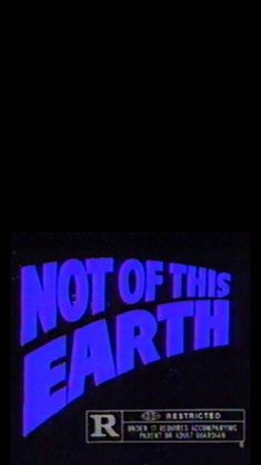 the title for not of this earth, written in blue and black on a dark background