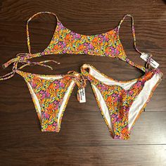 Never Been Worn! Didn’t Return In Time So Selling Here. Top Is The “Bali Top” (Pattern: A Tropical Night) Size Medium. Runs A Little On The Small Size (Imo). Bottoms Are Also Medium And A Tropical Night Pattern, But The String One Is The “Maria Bottom” And The Other Is The “Capri Bottom” And Were Closer To True Size But Definitely A Cheeky Fit. 20% Off Retail Price And This Season!!! Spring Pink Swimwear With Vibrant Print, Bright Swimwear, Tropical Night, Night Pattern, Swimsuit Inspo, Wrap Swimsuit, Baby Crop Top, Swimsuits Outfits, Vitamin Sea