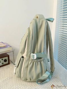 BirdinBag - Classic Backpack with Elegant Letter Patch Decoration Green Casual Bag For Students, Casual Green Bag For Students, Green Satchel Backpack Casual, Casual Green Satchel Backpack, Green Satchel Backpack With Pockets, Green School Bag With Pockets, Green Softback Shoulder Bag For Students, Green Shoulder Backpack With Pockets, Green Back-to-school Bag With Pockets