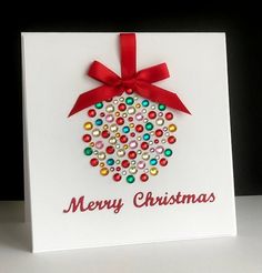 a card with a christmas ornament on it