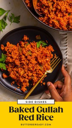 baked guluhan red rice on a black plate with a gold fork next to it