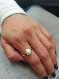 Pearl Solid Gold ring. This handmade gold engagement ring with Pearl is made of 14K genuine gold and set with pearl This 14 karat gold ring can serve as an engagement ring or a birthday gift, bridesmaid. * Gemstone -Natural pear pearl size: Pearl 8 mm round * Metal - 14K genuine gold . * Beautifully packaged, ready for gift giving. I make all my items with care and professionalism which I learnt from my father and grandfather. I am 4 generation of jewelers and all my knowledge can be seen in my Real Pearl Ring, Formal Yellow Gold Pearl Rings, Oval Pearl Ring In Yellow Gold, Oval Yellow Gold Pearl Ring, Yellow Gold Round Rings With Pearl Drop, 14k Gold Pearl Ring For Anniversary, Classic Round Rings With Pearl Drop, 14k Gold Open Pearl Ring For Anniversary, Gold Rings With Pearl Drop For Formal Occasions