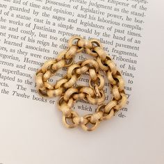 Talk about Georgian-era chain vibes! This rolo chain is incredibly charming - and such a big and bold look on the wrist as well. Each is beautifully textured for a look that is both vintage in feel and elegant. The links are also perfect for hanging charms! 18kt yellow gold, and measures 8.8" in length (we can adjust the length as needed). Please see qualitative report for more information. Timeless Chunky Link Chain Bracelet, Timeless Chunky Chain Link Bracelet, Timeless Link Bracelet With Chunky Chain, Timeless Link Bracelets With Chunky Chain, Timeless Gold Chain Bracelet, Timeless Oval Link Gold Bracelet, Timeless Gold Chain Link Bracelet, Timeless Bracelet With Chunky Chain And Oval Link, Classic Rolo Chain Bracelet