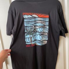 Nwt Men’s O’neill Surf Co. Core Surf Graphic Black T-Shirt Size Small. 100% Cotton. Chest Measurement Is 20 Inches Across And Length Is 27. 5 Inches Long. Black Surfing T-shirt With Screen Print, Black Screen Print Tops For Beach, Black Screen Print Top For Beach, Black Relaxed Fit T-shirt For Surfing, Black Graphic Tee For Surfing, Black Crew Neck Surfing Top, Black Graphic Print T-shirt For Surfing, Black Screen Print Surfing T-shirt, Black Crew Neck Top For Surfing