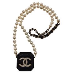 Beautiful and rare Chanel CC long pearl necklace Airpods case Faux pearls Black leather Golden chain Black acetate Total length cm 52 (x 2) Express shipping from Italy Long Pearl Necklace, Chanel Pearl, Chanel Pearls, Long Pearl Necklaces, Golden Chain, Airpods Case, Airpods Pro, Faux Pearl, Dream Closet