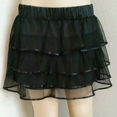 This Skirt Doesn't Photograph As Cute As It Is. It Is A Net Like Material With Satin Ribbon And Band Black Ruffled Mini Skirt For Night Out, Black Tiered Skirt For Night Out, Black Ruffled Skort For Party, Black Party Skort With Ruffles, Black Tiered Skort For Night Out, Black Ruffled Skirt Skort For Night Out, Black Ruffle, Wet Seal, Satin Ribbon