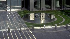 an aerial view of a circular walkway in front of a building