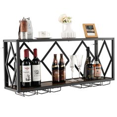 a metal shelf with bottles and glasses on it