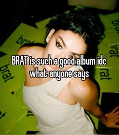 a woman in white shirt with text that reads bratt is such a good album id what anyone says