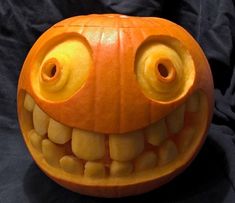 an orange pumpkin with big eyes and teeth on it's face is shown in the instagram