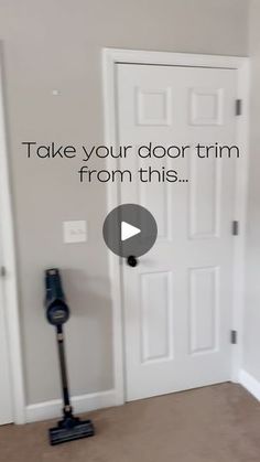 an image of a room with a vacuum on the floor and door trimming from this