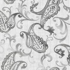 a white and gray wallpaper with an ornate design on the back side of it