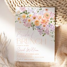 the bridal bridal party is set up on a table next to a wicker basket