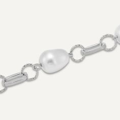 Add some elegant luxury to your jewellery box with this pearl bracelet. Featuring interlocking chain links and faux pearls on a classic rhodium plated bracelet. Rhodium Plated | Nickel, Lead, and Cadmium Free Product Code: DB2109R Collection: Audrey Type: Clasp Material: Base Alloy & Faux Pearls Dimensions: Length 20-24cm Pendant Dimensions: Style: Vintage & Chain-Link Includes: Luxury Silver Bracelets With Pearl Chain, Vintage Chain, Free Product, Chain Links, Bracelet Clasps, Short Necklace, Pearl Chain, Keep Jewelry, Pearl Drop Earrings