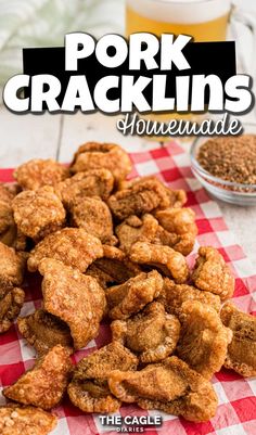 the cover of pork cracklings is shown on a red and white checkered tablecloth