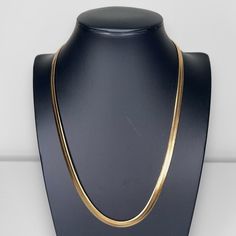 Presenting our latest addition: the Stainless Steel Herringbone Chain Necklace! Crafted with precision, this exquisite necklace showcases pointed links intricately interlocked to create a mesmerizing design. Its fluid yet sturdy construction ensures a seamless fit against the chest, promising comfort and confidence with every wear. Whether it's a solo statement piece or paired with your favorite attire, from business casual to everyday chic, this necklace effortlessly elevates any ensemble. Treat yourself or surprise a loved one with this essential accessory, perfect for those who appreciate impeccable fashion and timeless sophistication! Metal Herringbone Necklace Gift, Classic Gold Link Herringbone Necklace, Gold Classic Herringbone Link Necklace, Formal Gold Herringbone Necklace With Adjustable Chain, Classic Metal Necklace With Snake Chain, Classic Gold Snake Chain Necklace For Formal Occasions, Formal Herringbone Necklace With Adjustable Chain, Formal Gold Herringbone Chain Necklace, Formal Gold Herringbone Necklace