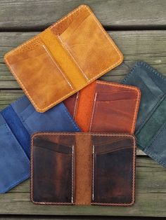 This wallet made of genuine crazy horse leather. It has 4 card slot and 2 small money slot. We can also write your name or a logo with a lazer machine. Dimensions: Width  : 15,5 cm (Opened); 7,5 cm (Closed) Length: 12 cm Leather Wallets As Gifts, Brown Textured Leather Bifold Wallet, Textured Leather Bifold Wallet For Daily Use, Textured Leather Card Holder For Everyday Use, Textured Leather Bifold Card Holder, Personalized Leather Wallet, Leather Card Wallet, Leather Card Holder, Clip Wallet