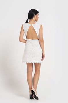 "A minimalist lace dress featuring trapeze silhouette, open back, and a mini length. - scoop neck - sleeveless - trapeze silhouette - above the knee length (mini) - backless (also you are able to order this dress with a fully closed back ) - concealed side zipper closure - fully lined Color : white Fabric: lace - 50 % cotton, 50 % polyester Lining: viscose - 95%, elastane - 5% For Size S: dress length - 33,5\" (85 cm). Our model wears size S (US 6) and is 171cm/5'7\" tall. MORE DRESSES: https:// Civil Court Wedding, Simple Short Wedding Dress, Court Wedding Dress, Reception Dress For Bride, White Reception Dress, Wedding Dress Mini, Wedding Dress Backless, White Reception, Skater Dresses Casual