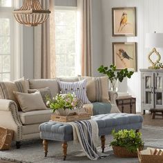 a living room filled with furniture and decor