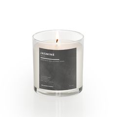 a glass candle with the label jasmine on it