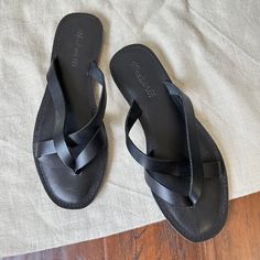 Nwob Madewell The Boardwalk Risa Strappy Thong Sandals In Black Leather Us 7 New Without Box. Never Worn! Elevate Your Summer Style With These Chic Madewell Boardwalk Risa Strappy Thong Sandals. Designed With A Sleek Black Leather Upper And Slip-On Closure, These Sandals Are Perfect For Any Occasion - From Casual Outings To Parties Or Even For Your Next Travel Adventure. The Flat Heel Style And Cushioned Insole Provide All-Day Comfort, While The Synthetic Outsole Ensures Durability. These Design Black Leather Flip Flops For Vacation, Casual Black Toe Post T-strap Sandals, Black T-strap Toe Post Sandals For Vacation, Black Single Toe Strap Flip Flops For Vacation, Black Toe Post T-strap Sandals For Vacation, Black T-strap Sandals With Single Toe Strap For Beach, Black Leather T-strap Flip Flops, Black T-strap Sandals With Leather Footbed, Black Leather Footbed Flip Flops With Toe Loop