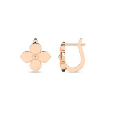 At the core of these La Fleur Diamond Huggie Hoops lies a radiant single bezel-set diamond surrounded by delicately crafted gold petals, reminiscent of a blooming flower in full bloom. These petals add a touch of nature-inspired charm to the design that effortlessly transitions from day to night. This makes the diamond-cut hoop earrings a must-have accessory for any fashion-forward individual. Elegant Yellow Gold Petal-shaped Jewelry, Elegant Petal-shaped Yellow Gold Jewelry, Replica Jewelry, Bezel Set Diamond, Vs Diamond, Radiant Diamond, Diamond Settings, Diamond Hoop Earrings, Dream Jewelry