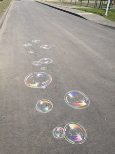 an empty street with bubbles drawn on it