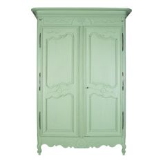 a green armoire with ornate carvings on the front and sides, against a white background