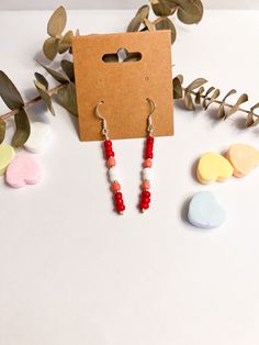 These stunning red, pink, and white stick earrings are the perfect accessory to add a pop of color to your Valentine's Day outfit! ✨💖 Measuring approximately one and a half inches in length, these earrings are lightweight and comfortable to wear all day long. The vibrant red and white color scheme makes them a great statement piece for any occasion, especially Valentine's Day. 💌 These earrings are the perfect gift for anyone who loves handmade, jewelry, and unique accessories. They come carefu Trendy Red Beaded Earrings As Gift, Trendy Red Beaded Earrings For Gift, Stick Earrings, Valentine's Day Outfit, Vibrant Red, Accessories Unique, Seed Beads, Jewelry Earrings Dangle, Etsy Earrings