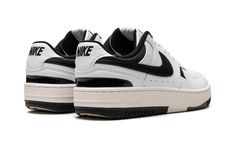 The Women’s Nike Gamma Force “White/Black” is a women’s-exclusive colorway of the old school-inspired lifestyle sneaker with a versatile appearance.  The Gamma Force’s design nods to basketball shoe aesthetics from the 1980s.  White leather is featured on the shoe’s upper while a black leather Swoosh appears on the sides.  Additional black detailing can be found on the overlays that appear throughout the design.  Black “Nike” branding is embroidered on the heel and printed on the tongue tag.  A Shoe Aesthetics, Nike Gamma Force, White Black Shoes, Shoes For School, Nike Branding, White Nike Shoes, Black And White Nikes, Black Nike Shoes, Shoe Wishlist