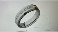 an image of a wedding ring with diamonds on it